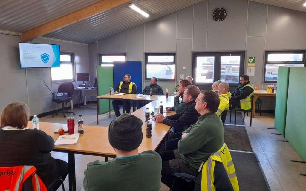 employees in classroom attending Harlow OLAT training course